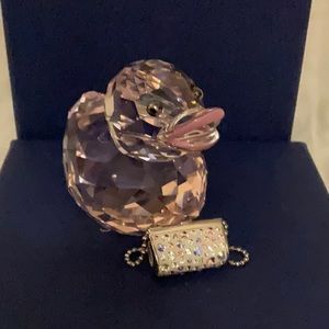 Swarovski Fancy Rosaline with her purse